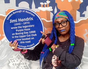 Neandra Etienne with Hendrix’s plaque. Photo: Neandra Etienne